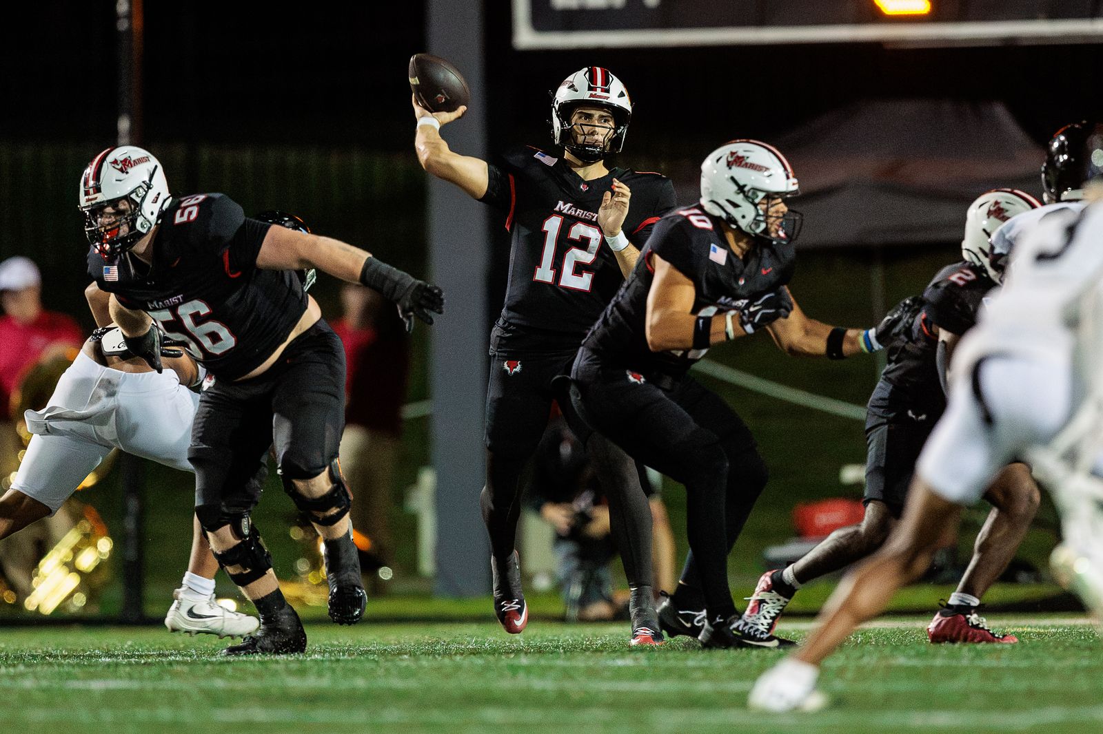 Football: Marist quarterback Sonny Mannino throws a pass against Franklin Pierce — photographed by Michael LaCroix-Fralish for 845 Sports Rewind