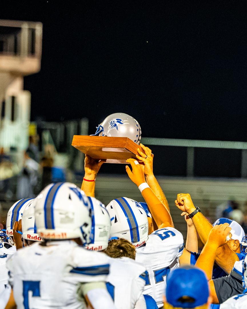 Football: Valley Central hoists the Helmet after beating Wallkill — photographed by Tim Reynolds for 845 Sports Rewind