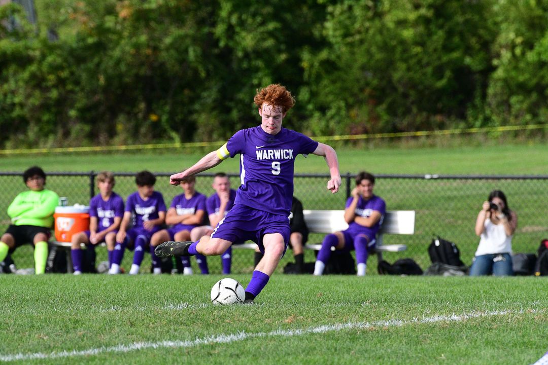 Soccer: Warwick's Nick Ryan strikes the ball against Delaware Valley — photographed by William Cutler for 845 Sports Rewind