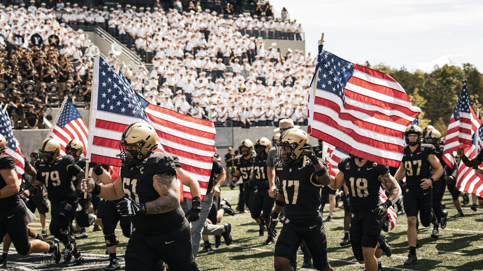 Football: Army takes the field with American flags against South Florida at Michie Stadium — photographed by Will Barron for 845 Sports Rewind