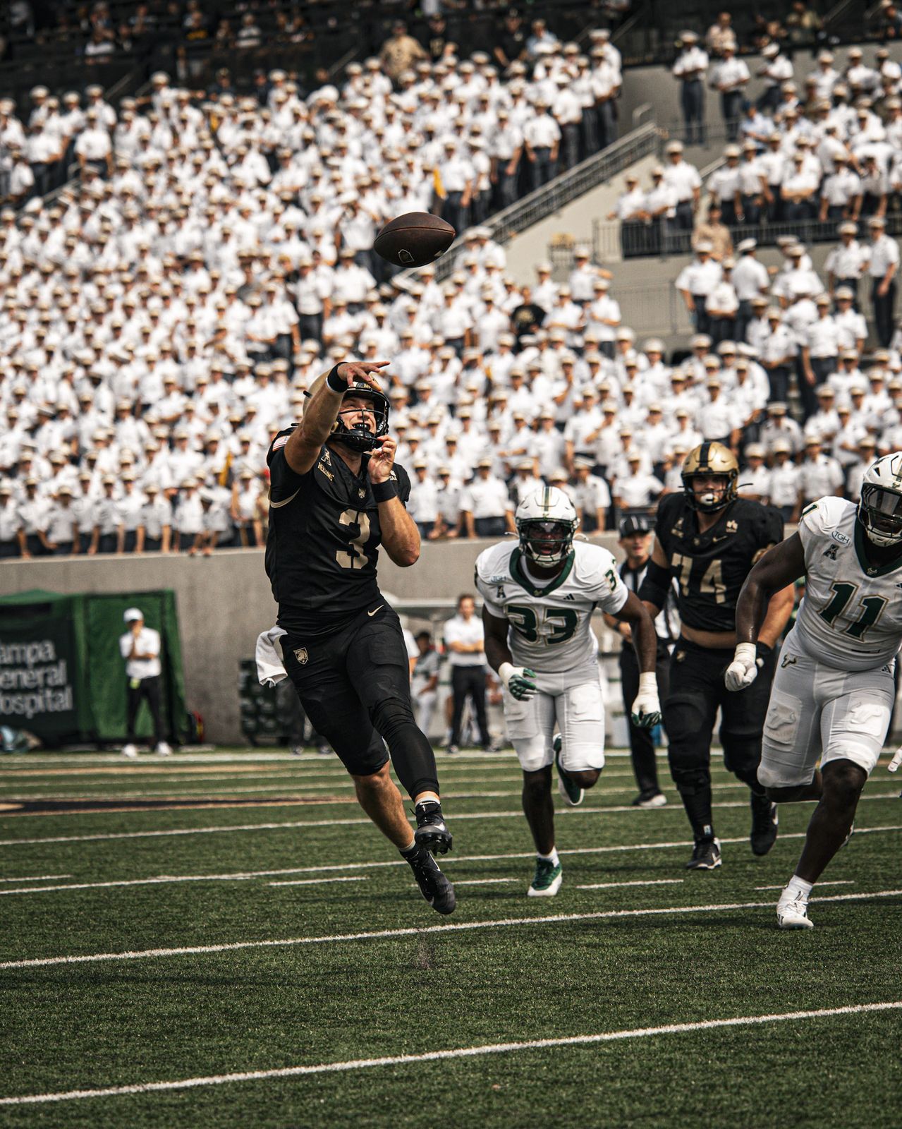 Football: Army quarterback Cale Hellums makes a catch against South Florida at Michie Stadium — photographed by Will Barron for 845 Sports Rewind