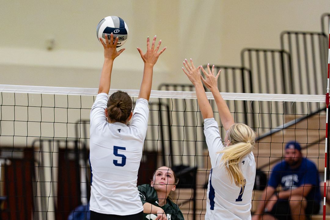 Volleyball: Monroe-Woodbury blocks at the net against Minisink Valley — photographed by 845 Sports Rewind Staff