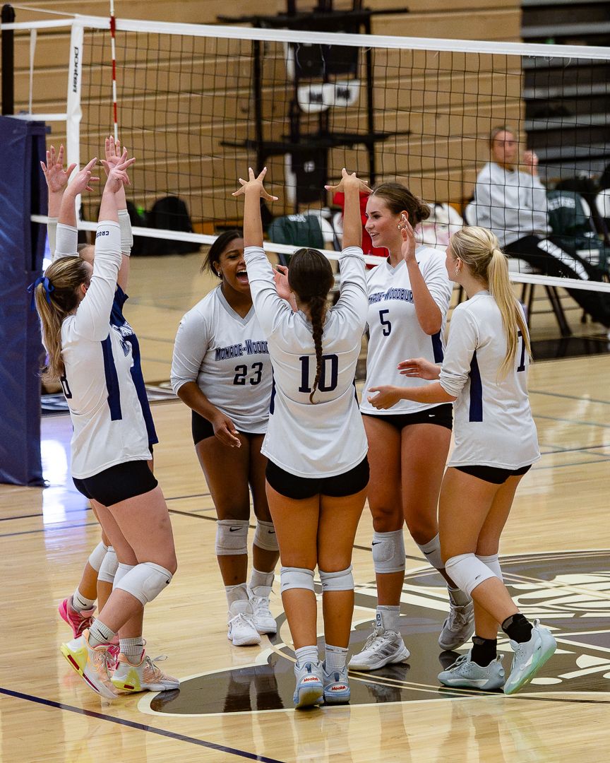 Volleyball: Monroe-Woodbury celebrates together after the match — photographed by 845 Sports Rewind Staff