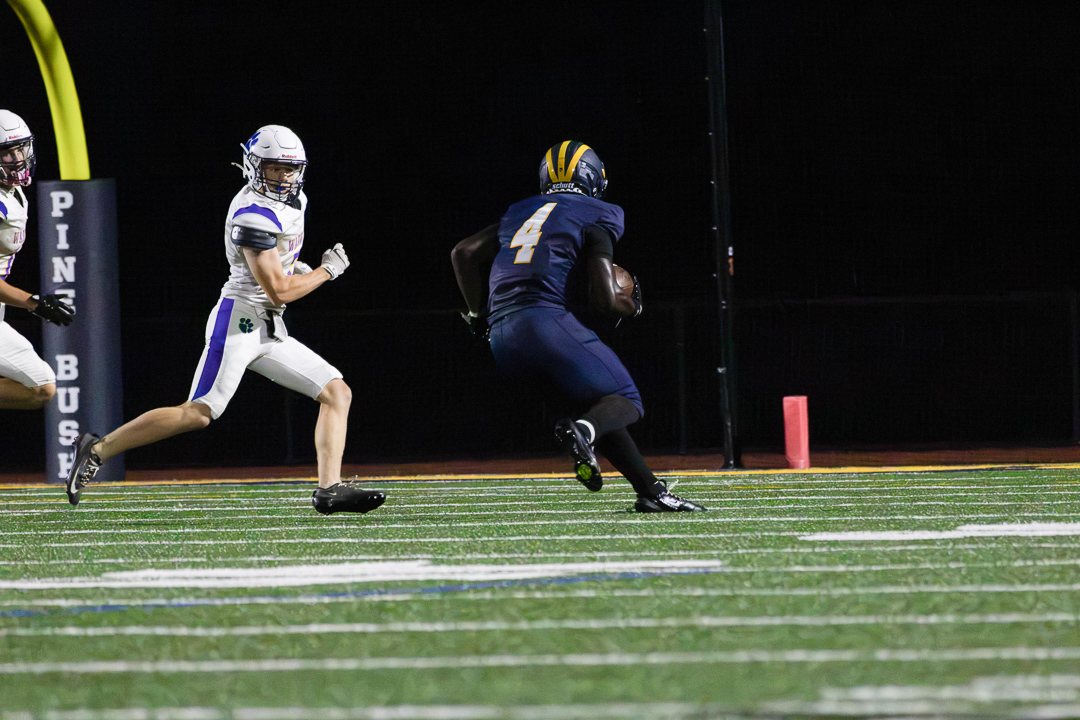 Football: A Pine Bush ball carrier heads for the end zone against Warwick &mdash; photographed by Chase Plowden for 845 Sports Rewind
