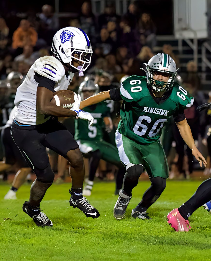 Football: A Middletown ball carrier looks for room against Minisink Valley — photographed by Bret B. for 845 Sports Rewind