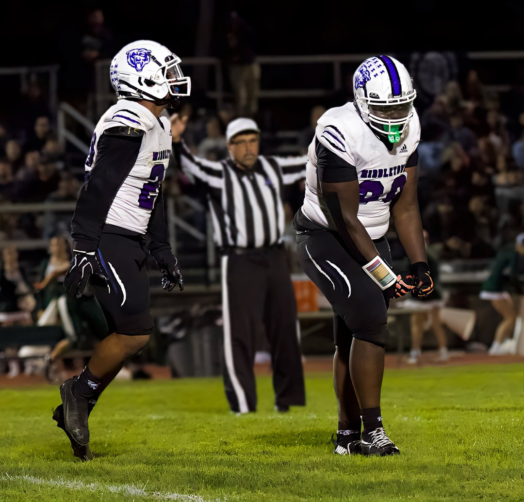 Football: Middletown defenders react after a play against Minisink Valley — photographed by Bret B. for 845 Sports Rewind