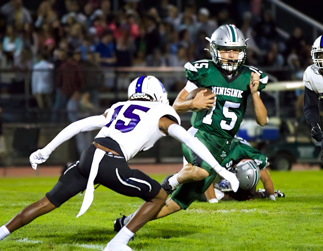 Football: Minisink Valley&rsquo;s quarterback scrambles away from Middletown pressure &mdash; photographed by Bret B. for 845 Sports Rewind