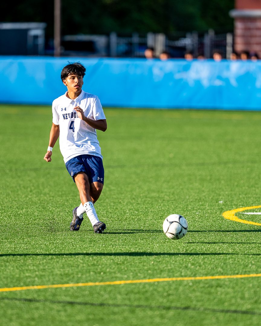 Boys soccer: Newburgh’s No. 4 pushes the ball up the field at Middletown — photographed by 845 Sports Rewind Staff