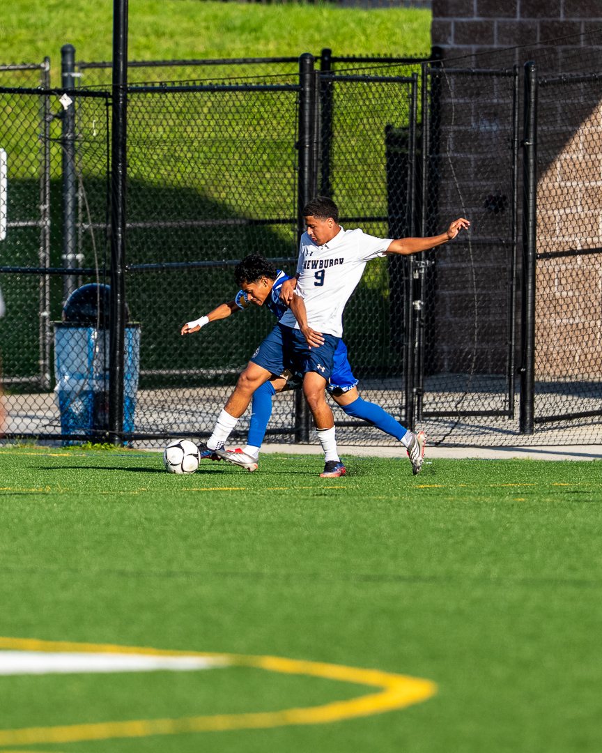 Boys soccer: Newburgh&rsquo;s No. 9 battles for possession along the sideline &mdash; photographed by 845 Sports Rewind Staff