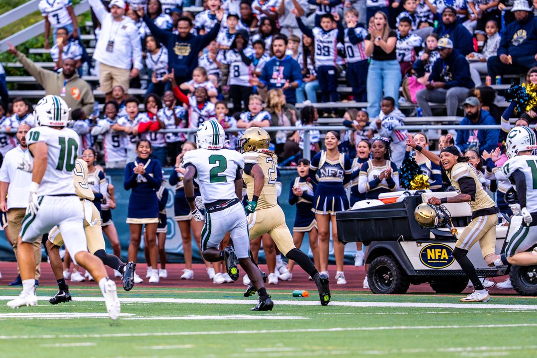 Football: Newburgh Free Academy’s Justin Lassic (2) races down the sideline as teammates and fans cheer him on, with Cornwall’s Lekeaka Fonkem (2) and Charles Caoili (10) in pursuit at Newburgh — photographed by 845 Sports Rewind Staff for 845 Sports Rewind