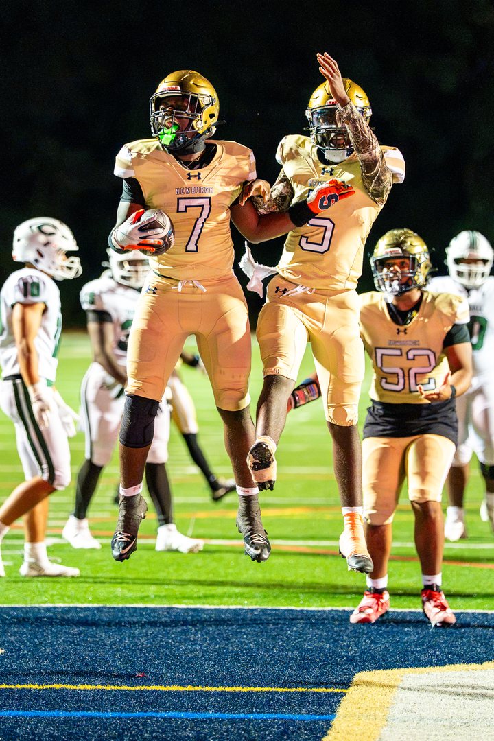 Football: Newburgh Free Academy’s Nyeir Johnson (7) and quarterback Jaiseon Barnwell (5) leap to celebrate in the end zone after a touchdown at Newburgh — photographed by 845 Sports Rewind Staff for 845 Sports Rewind