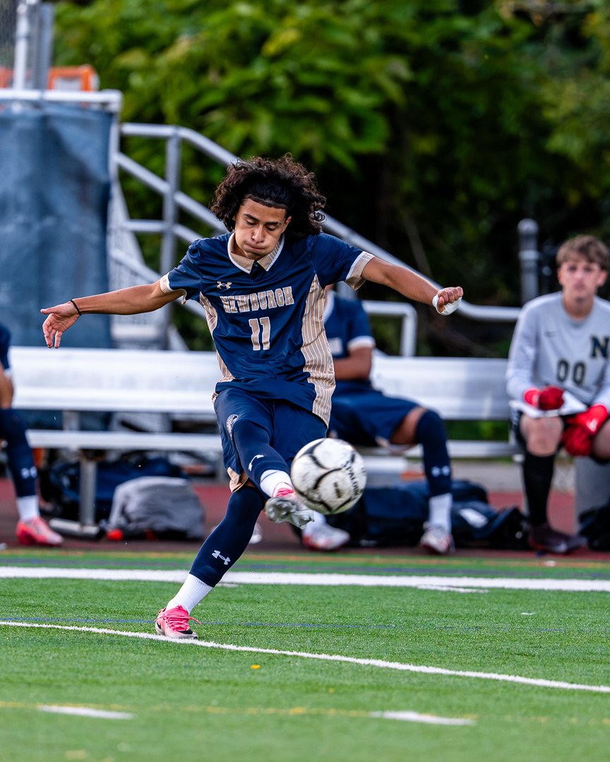 Boys soccer: Newburgh Free Academy&rsquo;s No. 11 strikes the ball along the sideline against Monroe-Woodbury &mdash; 845 Sports Rewind staff photo