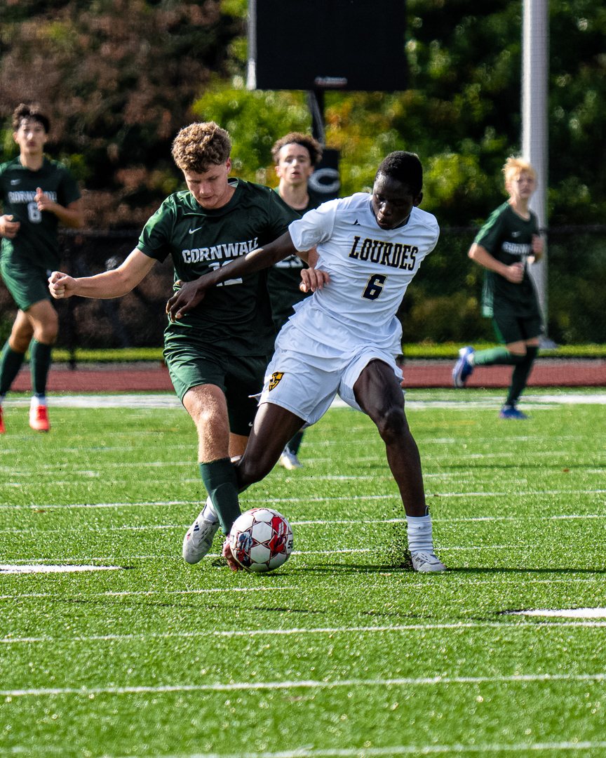 Boys soccer: Lourdes&rsquo; No. 6 shields the ball away from a Cornwall defender &mdash; 845 Sports Rewind staff photo