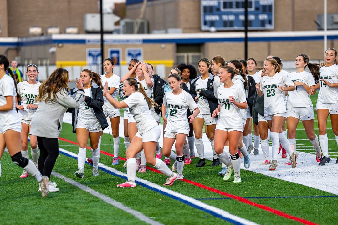 Girls soccer: Cornwall players celebrate along the sideline after the semifinal win at Washingtonville &mdash; 845 Sports Rewind staff photo