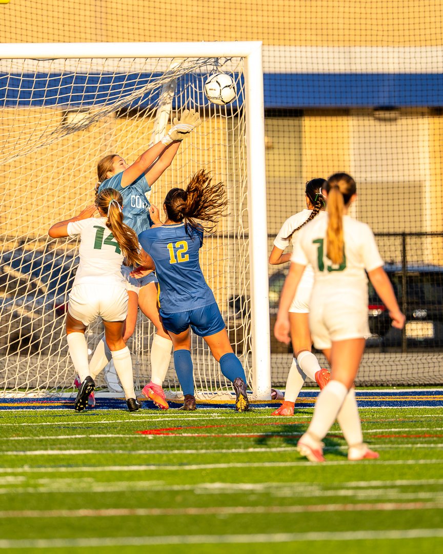Girls soccer: Cornwall goalkeeper Courtney Karbiner leaps to tip the ball over the crossbar against Washingtonville &mdash; 845 Sports Rewind staff photo