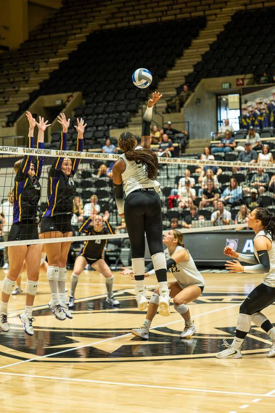 Volleyball: Army attacks at the net against UAlbany's block — photographed by Tim Reynolds for 845 Sports Rewind